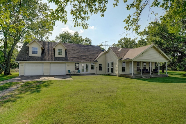 12655 Lawrence Unit 2155, Mount Vernon, MO 65712 - view of front facade with driveway, french doors, a front lawn, an attached garage, and roof with shingles