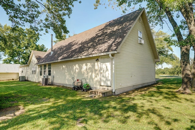 12655 Lawrence Unit 2155, Mount Vernon, MO 65712 - view of home's exterior featuring a lawn and roof with shingles