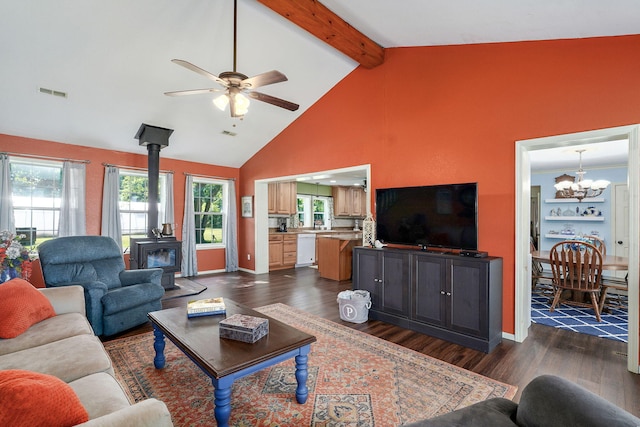 12655 Lawrence Unit 2155, Mount Vernon, MO 65712 - living room with a wood stove, a chandelier, a ceiling fan, dark wood finished floors, and beam ceiling