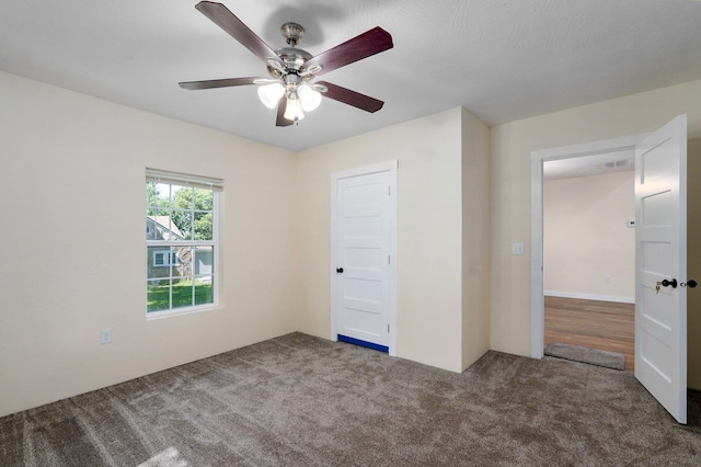 114 N Hobbs St, Miller, MO 65707 - unfurnished bedroom with carpet flooring and a ceiling fan