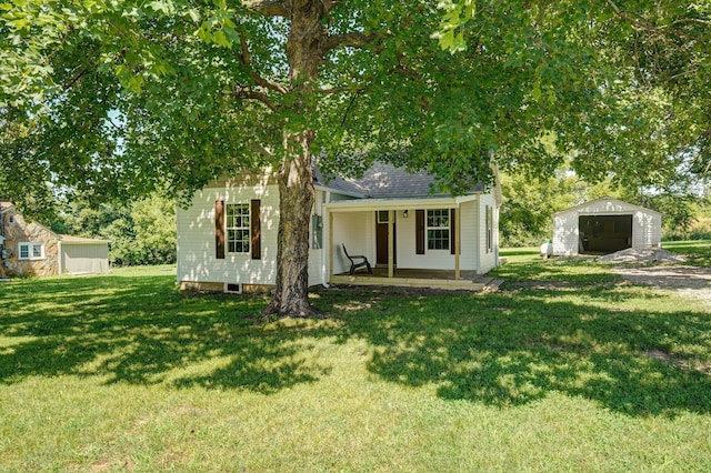 114 N Hobbs St, Miller, MO 65707 - view of property hidden behind natural elements with a detached garage, an outdoor structure, a porch, a front yard, and roof with shingles