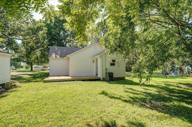 114 N Hobbs St, Miller, MO 65707 - view of green lawn with a deck