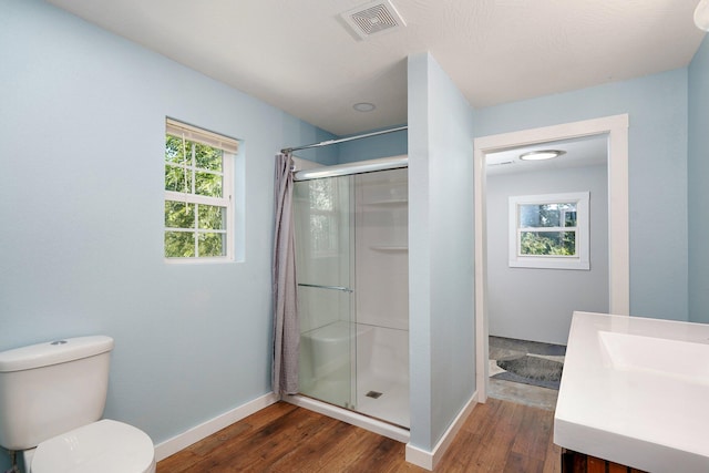 114 N Hobbs St, Miller, MO 65707 - full bath featuring wood finished floors, vanity, and a shower with curtain