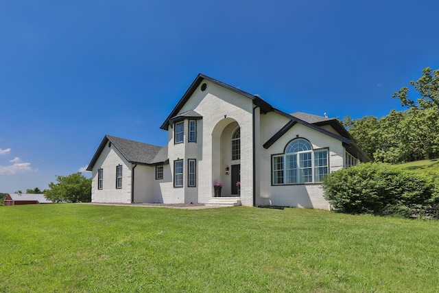 295 Headwaters Dr, Marshfield, MO 65706 - view of front of house with a front lawn and brick siding