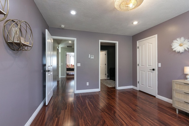 295 Headwaters Dr, Marshfield, MO 65706 - unfurnished bedroom with wood finished floors and recessed lighting