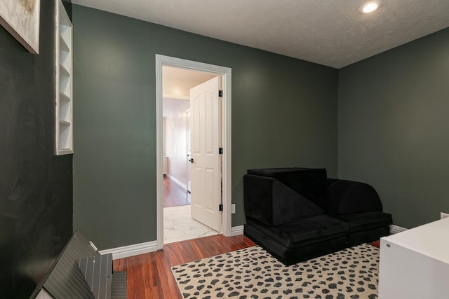 295 Headwaters Dr, Marshfield, MO 65706 - living area with wood finished floors, a textured ceiling, and recessed lighting