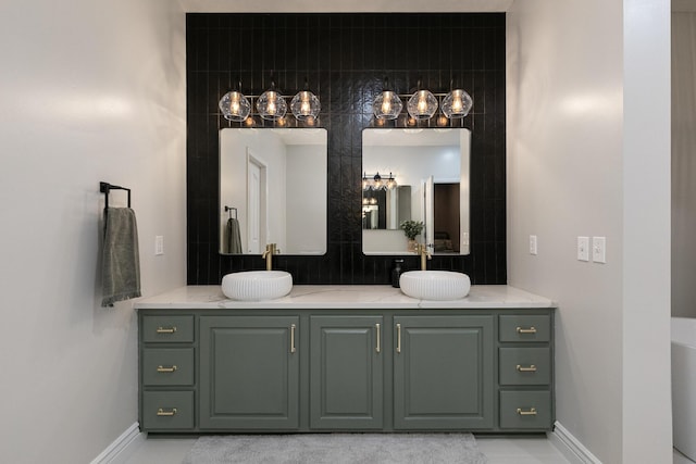 295 Headwaters Dr, Marshfield, MO 65706 - bathroom featuring double vanity and baseboards
