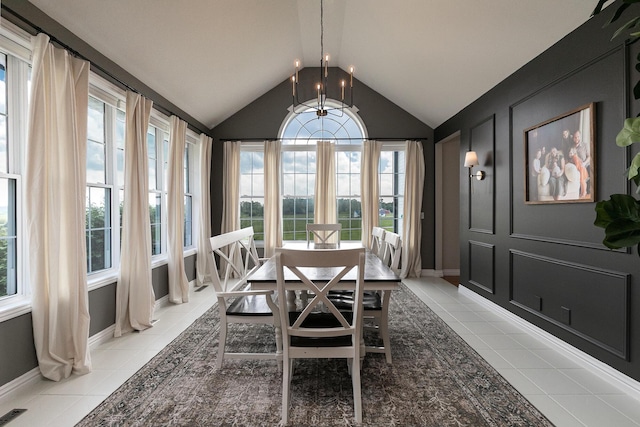 295 Headwaters Dr, Marshfield, MO 65706 - dining area featuring plenty of natural light, a chandelier, vaulted ceiling, and light tile patterned floors