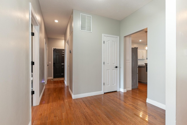 295 Headwaters Dr, Marshfield, MO 65706 - hall featuring light wood-type flooring and recessed lighting