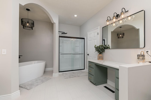 295 Headwaters Dr, Marshfield, MO 65706 - bathroom featuring a shower stall, a freestanding tub, and vanity