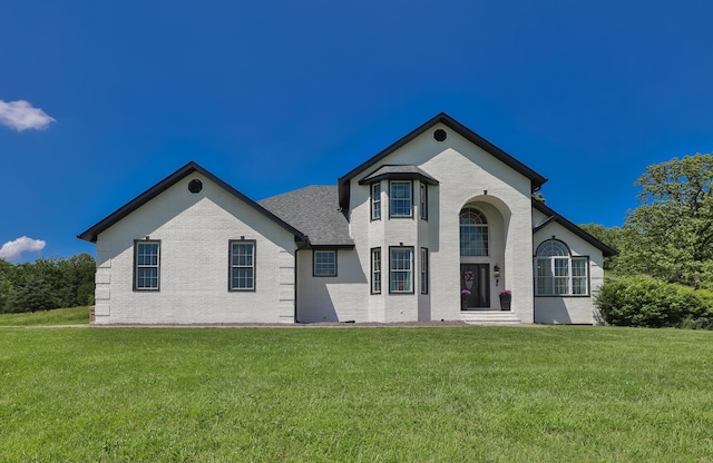 295 Headwaters Dr, Marshfield, MO 65706 - view of front facade with brick siding and a front yard