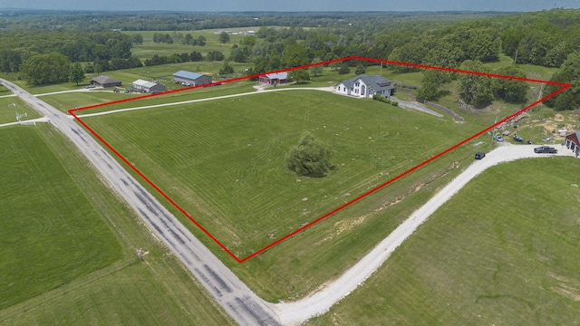 295 Headwaters Dr, Marshfield, MO 65706 - aerial view of sparsely populated area with property parcel outlined and a heavily wooded area