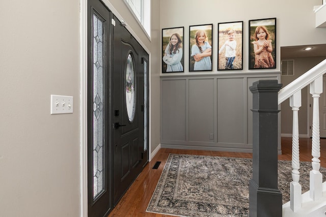 295 Headwaters Dr, Marshfield, MO 65706 - entryway with a decorative wall, stairway, and wood finished floors