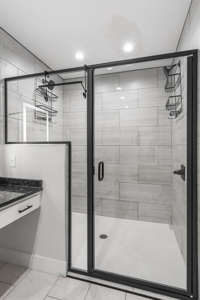 940 E Powers Ct, Nixa, MO 65714 - bathroom featuring vanity, a stall shower, and recessed lighting