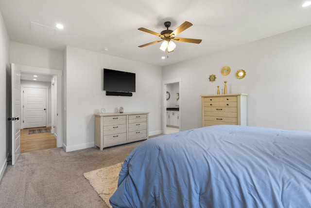 940 E Powers Ct, Nixa, MO 65714 - bedroom with light colored carpet, recessed lighting, connected bathroom, and a ceiling fan