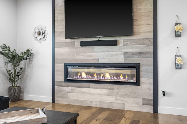 940 E Powers Ct, Nixa, MO 65714 - detailed view of a fireplace and wood finished floors