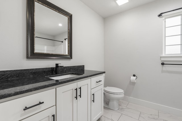 940 E Powers Ct, Nixa, MO 65714 - bathroom with marble finish flooring, vanity, and a shower