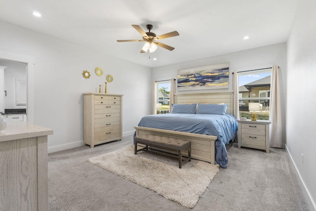 940 E Powers Ct, Nixa, MO 65714 - bedroom with light colored carpet, recessed lighting, and a ceiling fan