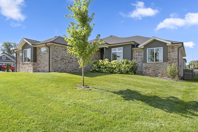 940 E Powers Ct, Nixa, MO 65714 - view of front facade with a front yard and brick siding