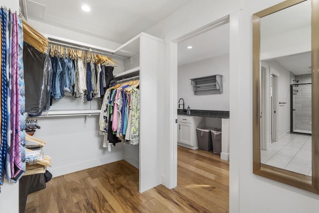 940 E Powers Ct, Nixa, MO 65714 - walk in closet with wood finished floors
