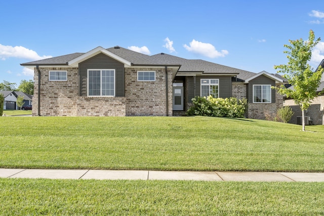 940 E Powers Ct, Nixa, MO 65714 - view of front of home featuring a front yard and brick siding