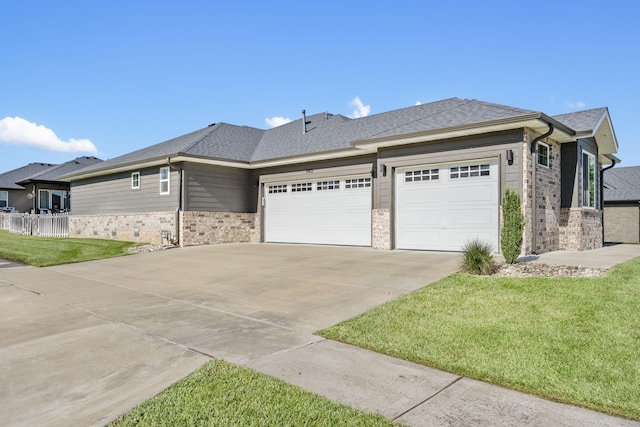 940 E Powers Ct, Nixa, MO 65714 - view of front of home featuring an attached garage, concrete driveway, brick siding, and a shingled roof