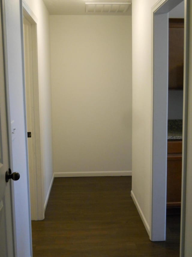 424 Echo Valley Cir, Reeds Spring, MO 65737 - hall with dark wood finished floors and baseboards