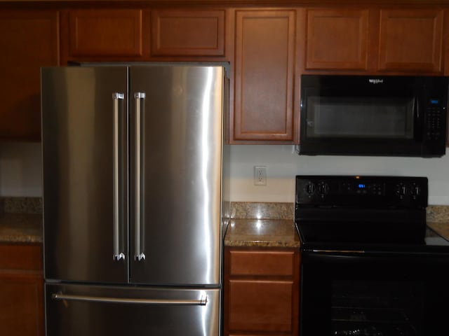 424 Echo Valley Cir, Reeds Spring, MO 65737 - kitchen featuring black appliances and brown cabinets