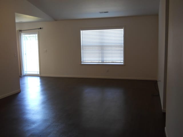 424 Echo Valley Cir, Reeds Spring, MO 65737 - unfurnished room with baseboards and dark wood-style floors