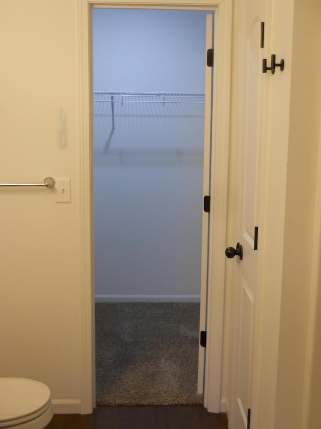 424 Echo Valley Cir, Reeds Spring, MO 65737 - bathroom featuring toilet and baseboards