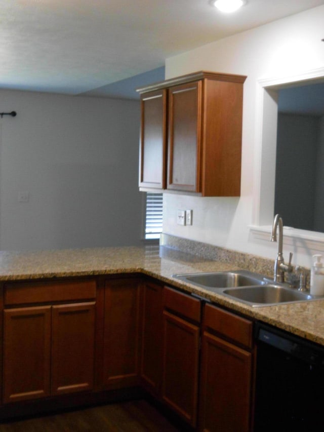 424 Echo Valley Cir, Reeds Spring, MO 65737 - kitchen with black dishwasher, a peninsula, dark wood-type flooring, and light stone counters