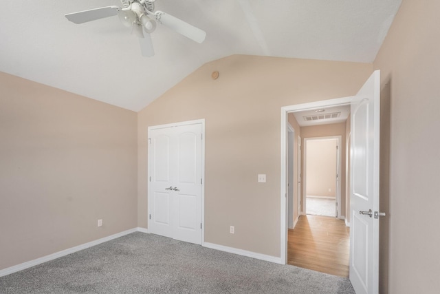 663 N Althea Ave, Nixa, MO 65714 - unfurnished bedroom with lofted ceiling, carpet flooring, and ceiling fan