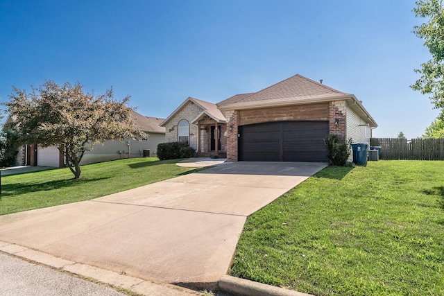 663 N Althea Ave, Nixa, MO 65714 - ranch-style home with brick siding, a garage, driveway, and a shingled roof
