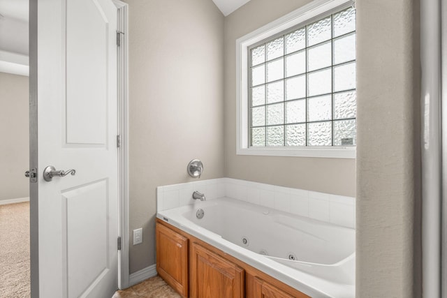 663 N Althea Ave, Nixa, MO 65714 - full bath with a tub with jets and baseboards