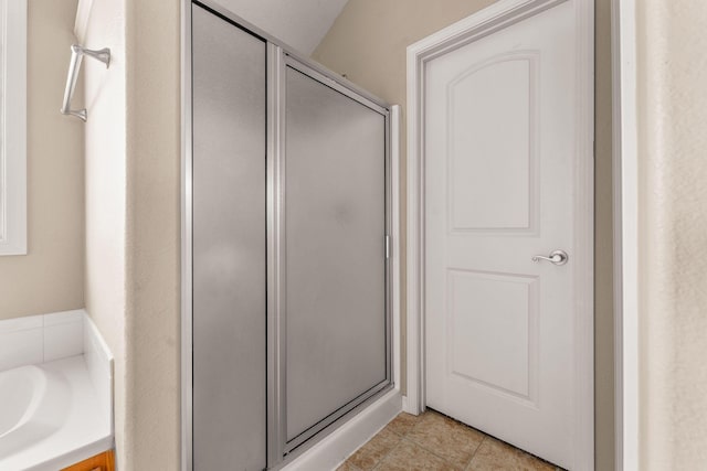 663 N Althea Ave, Nixa, MO 65714 - bathroom featuring a shower stall and tile patterned floors