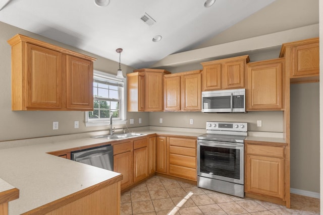 663 N Althea Ave, Nixa, MO 65714 - kitchen with appliances with stainless steel finishes, vaulted ceiling, light countertops, hanging light fixtures, and light tile patterned floors