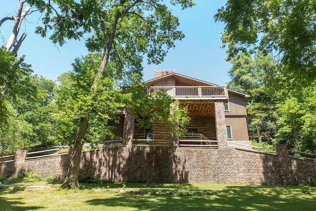 23 Sweetwater Ln, Buffalo, MO 65622 - back of house with a deck, a yard, stairs, and a chimney