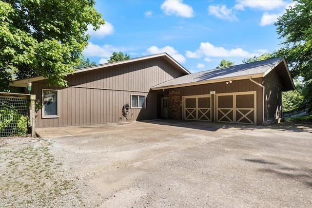 23 Sweetwater Ln, Buffalo, MO 65622 - view of front of home with a garage and asphalt driveway