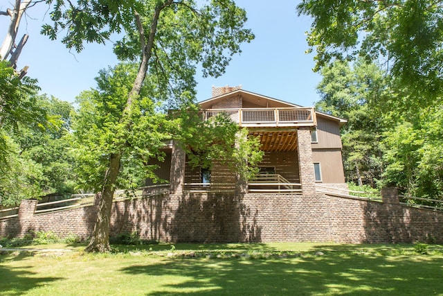 23 Sweetwater Ln, Buffalo, MO 65622 - back of property with a lawn and a wooden deck