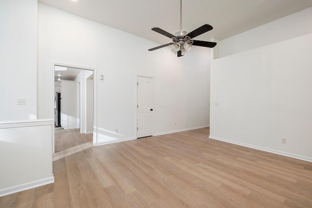 903 N 4th St, Ozark, MO 65721 - spare room with ceiling fan, high vaulted ceiling, and light wood finished floors