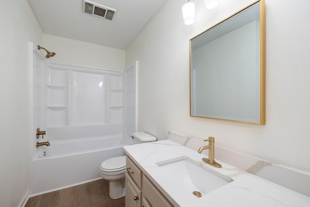 903 N 4th St, Ozark, MO 65721 - bathroom with vanity, wood finished floors, and washtub / shower combination