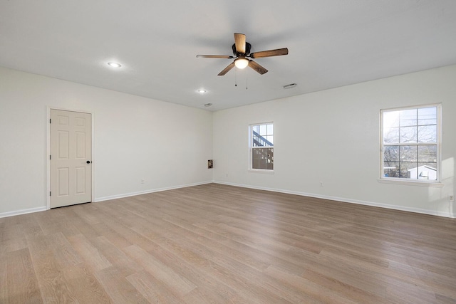 903 N 4th St, Ozark, MO 65721 - empty room with a ceiling fan, light wood finished floors, and recessed lighting