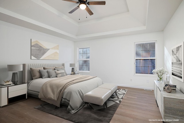 903 N 4th St, Ozark, MO 65721 - bedroom with wood finished floors and a raised ceiling