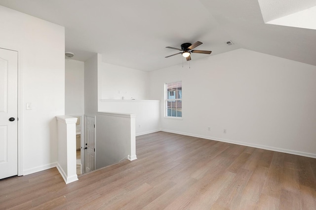 903 N 4th St, Ozark, MO 65721 - empty room with a ceiling fan, wood finished floors, and vaulted ceiling
