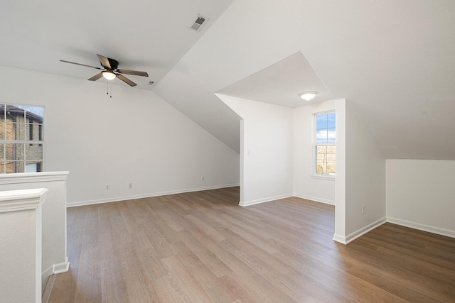 903 N 4th St, Ozark, MO 65721 - additional living space featuring a ceiling fan, wood finished floors, and lofted ceiling