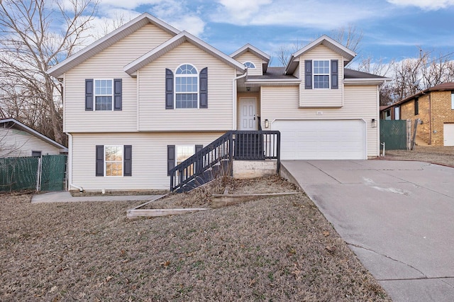 903 N 4th St, Ozark, MO 65721 - view of front of property featuring concrete driveway and a garage