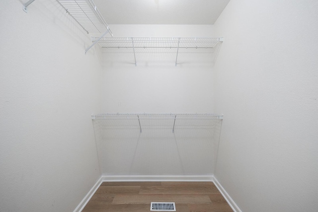903 N 4th St, Ozark, MO 65721 - spacious closet featuring wood finished floors
