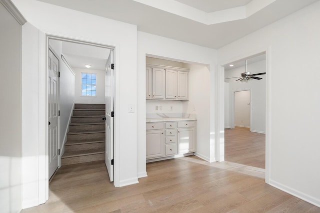 903 N 4th St, Ozark, MO 65721 - staircase with wood finished floors and a ceiling fan