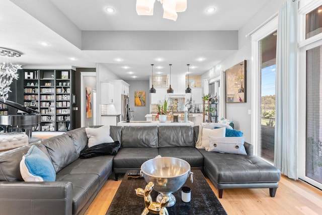 3972 E Dunrobin Dr, Springfield, MO 65809 - living room featuring light wood-style floors and recessed lighting