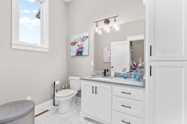 3972 E Dunrobin Dr, Springfield, MO 65809 - bathroom featuring vanity, marble look tiles, and a chandelier